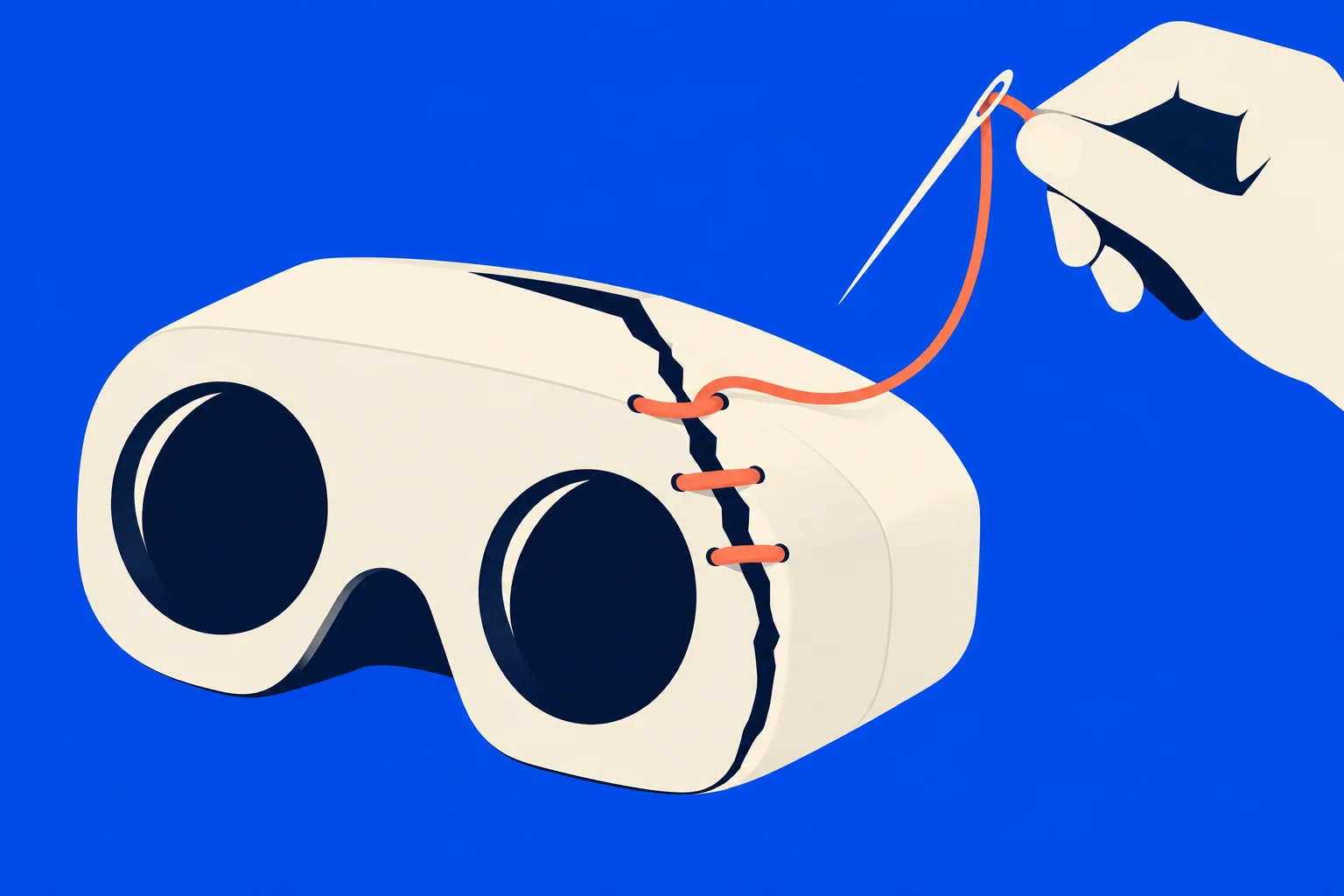 A hand uses a needle and orange thread to stitch a crack in a cream virtual reality headset against a blue background.